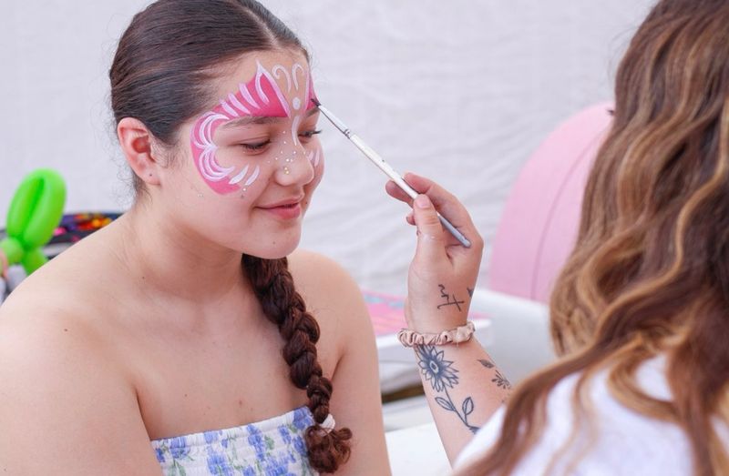 Close-up princess butterfly face painting detail in Texas